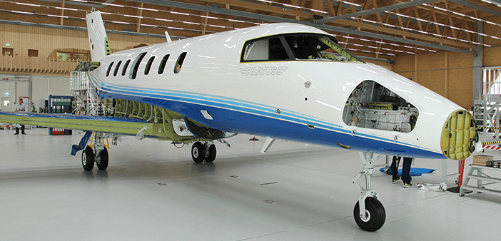 Levaero's first PC-24 aircraft standing on its own legs in the assembly hangar.
