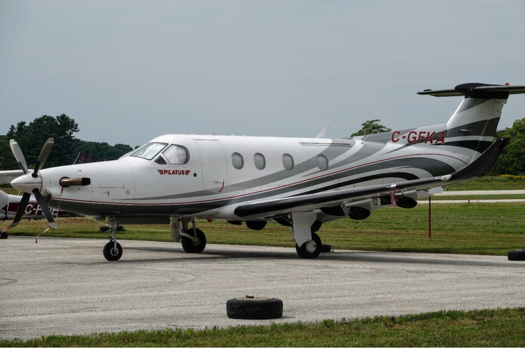 Aircraft of the 1997 Pilatus PC-12 model at the airport.