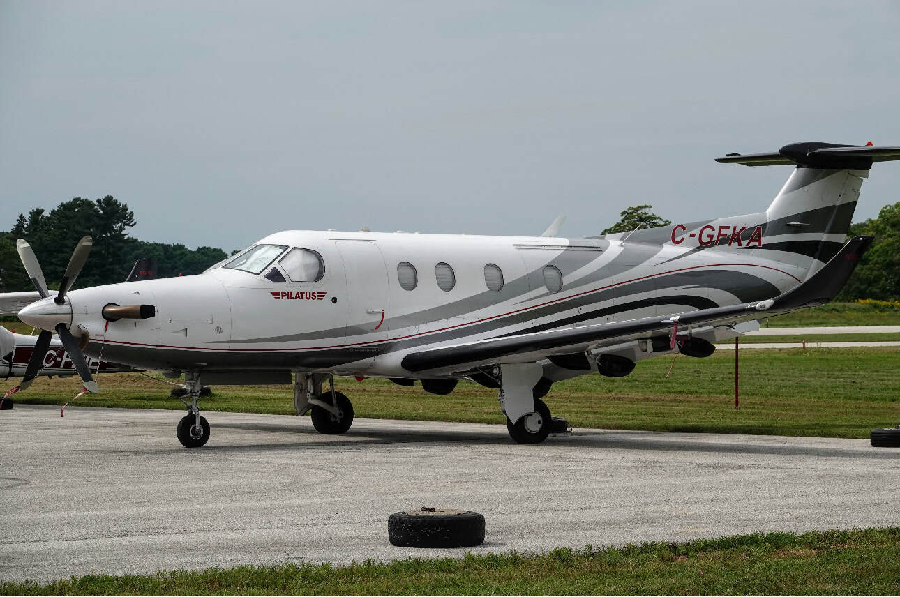 Aircraft of the 1997 Pilatus PC-12 model at the airport.