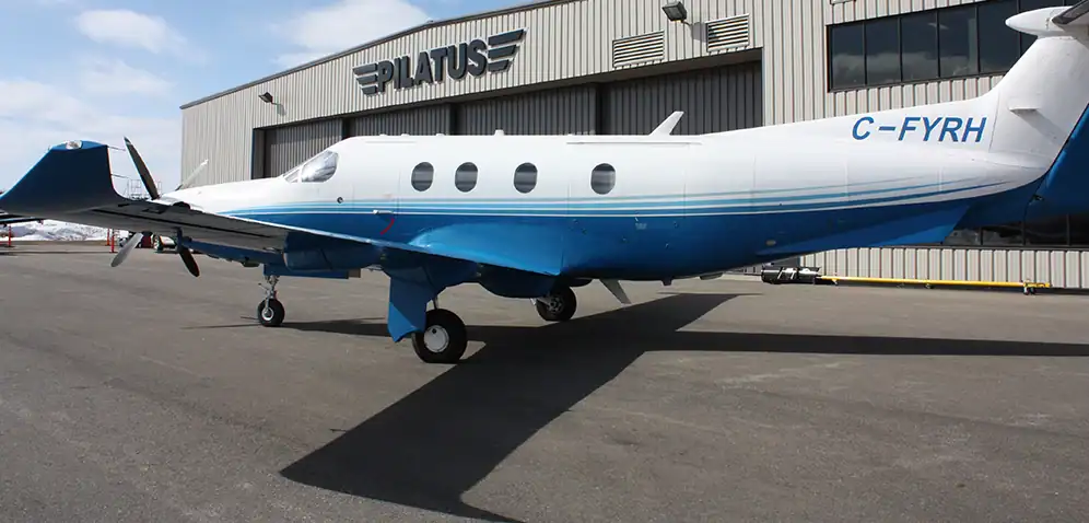 Private jet parked outside Levaero airport facility.