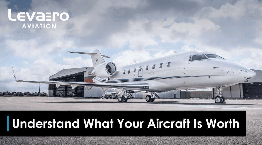 Modern private jet parked on tarmac, showcasing aircraft value factors.