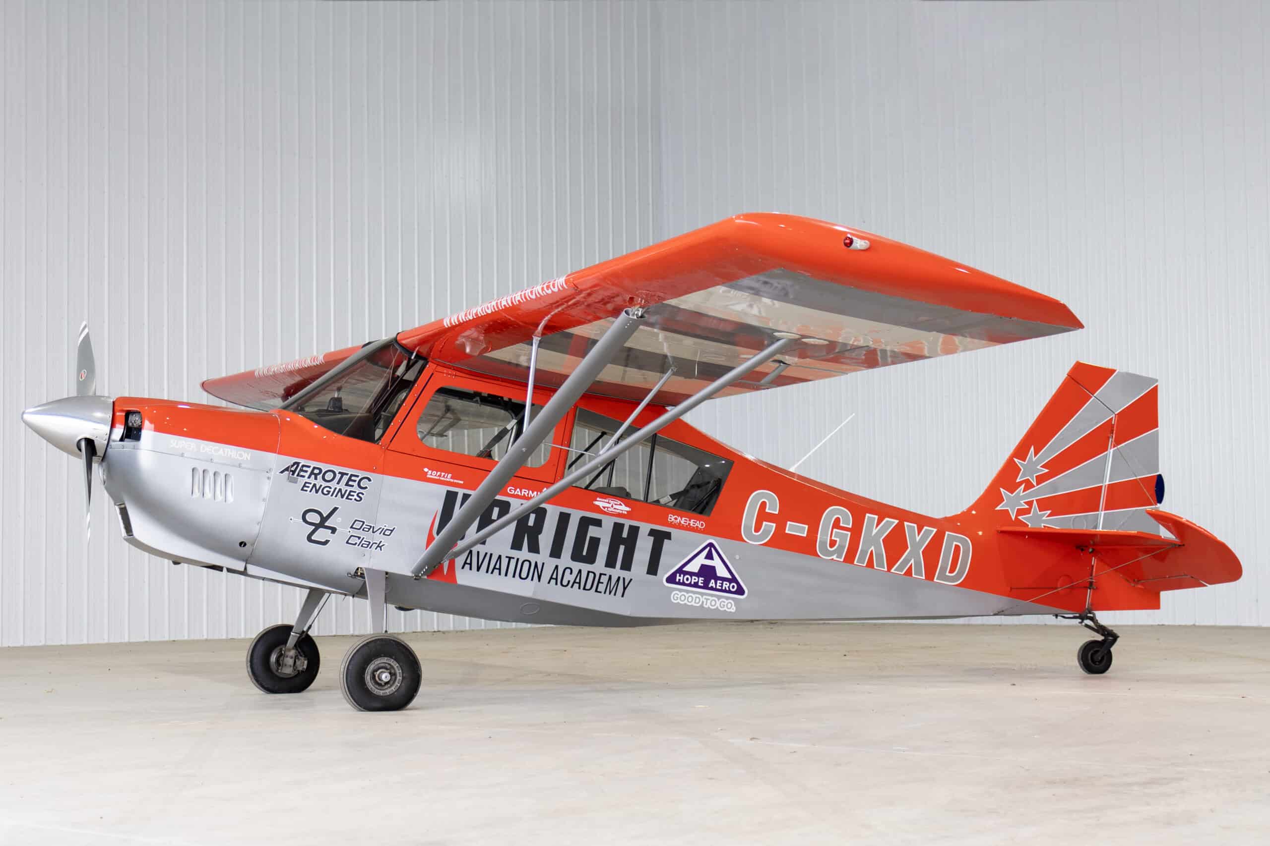 Levaero Super Decathlon 8KCAB with orange and white livery.