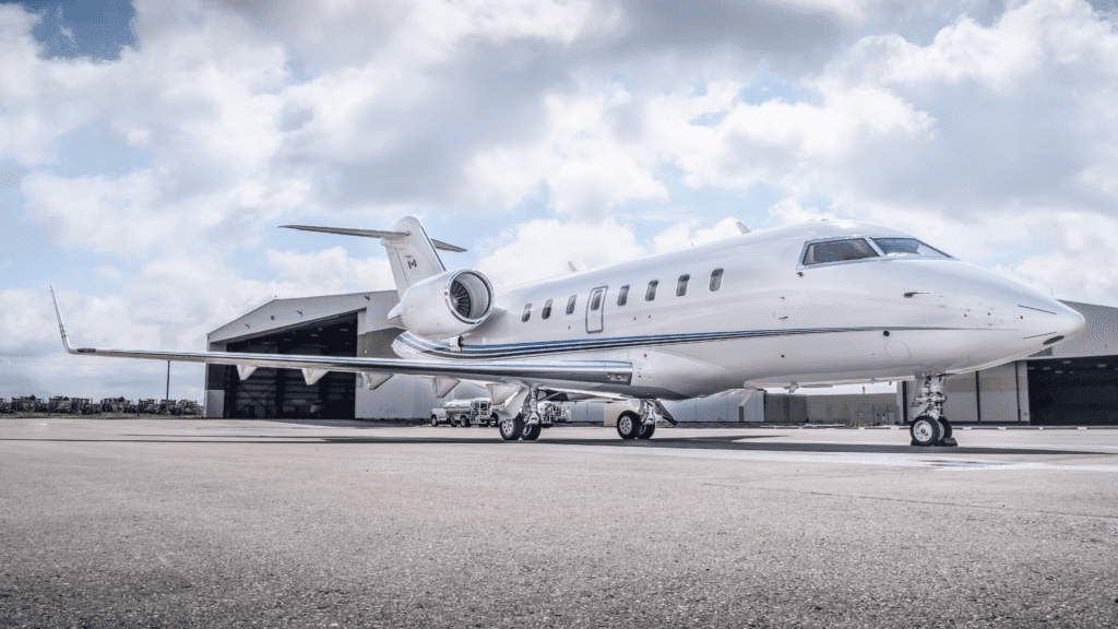 Private jet on runway, showcasing aviation solutions at Levaero.