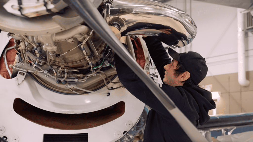 Aircraft engine inspection and repair inside a hangar.