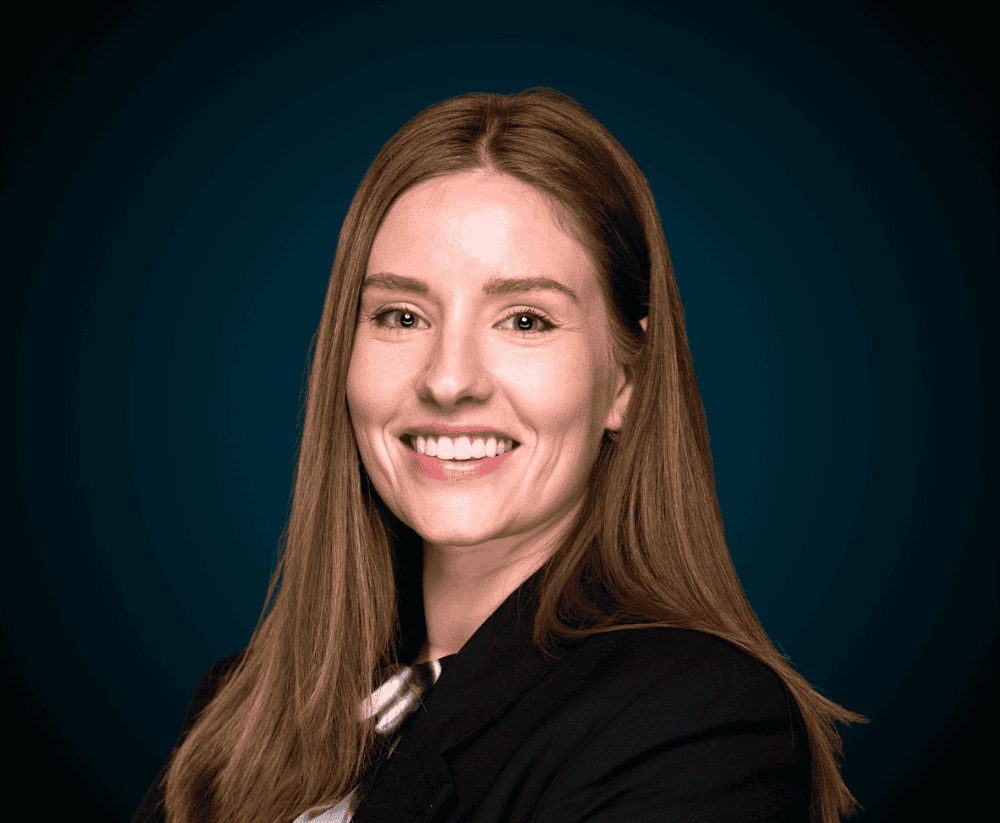 Professional woman smiling, representing Levaero's team and expertise.